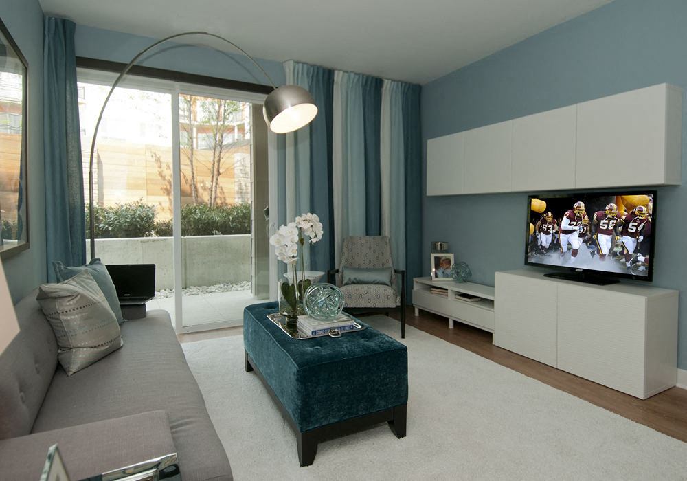 a living room with a couch and a tv