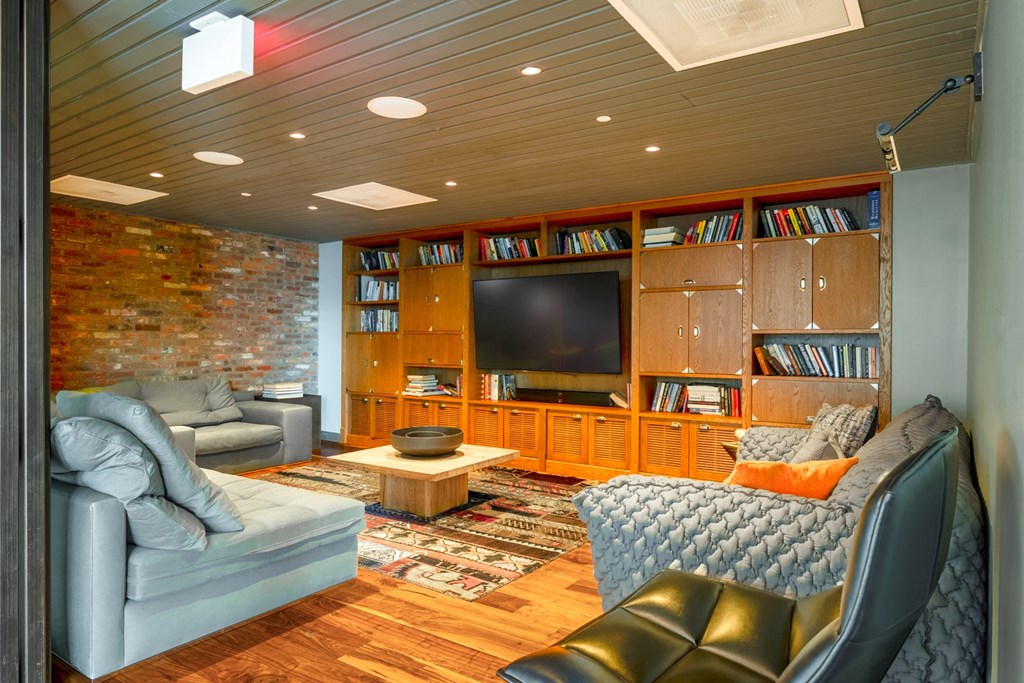 a living room with a couch and a tv