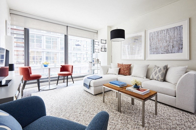 a living room with a couch and a table