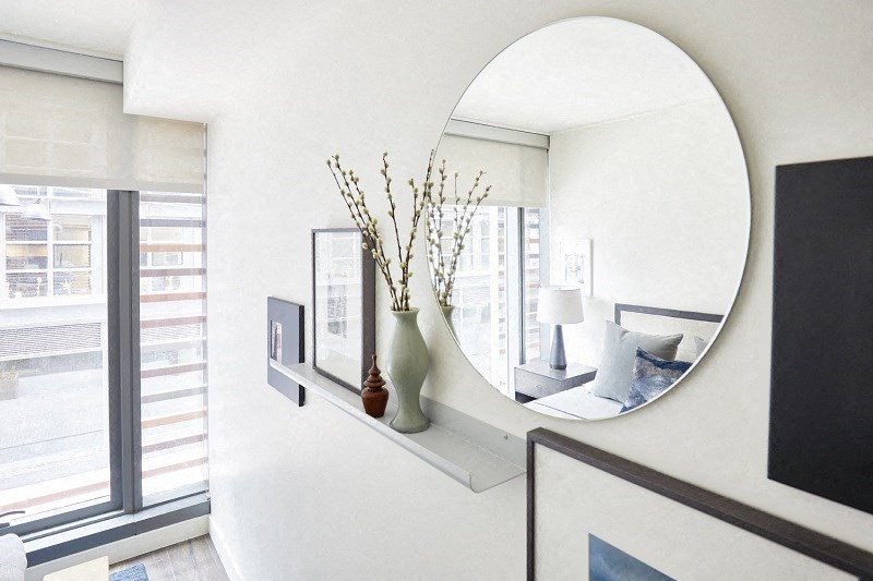 a mirror on a wall in a living room