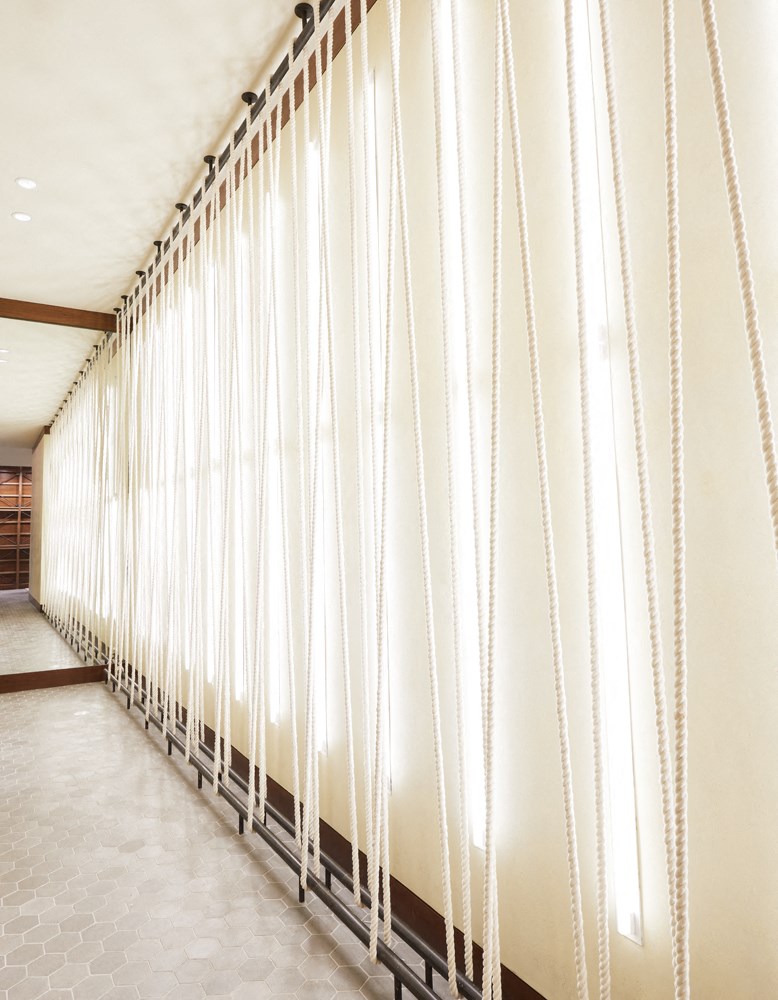 a long row of empty stadium bleachers in a building