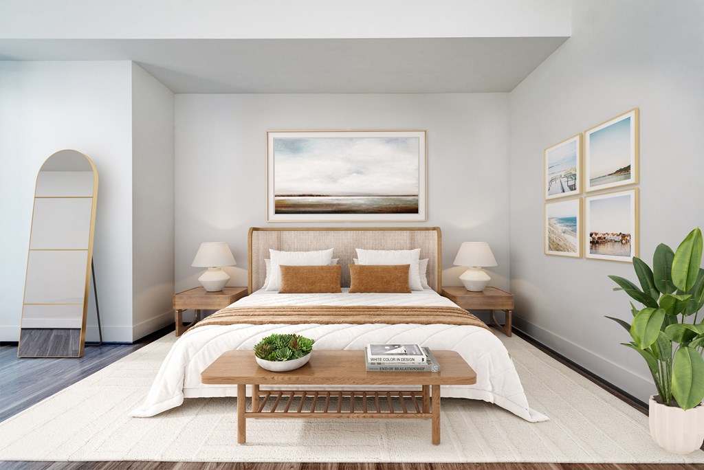 a bedroom with a bed and a table