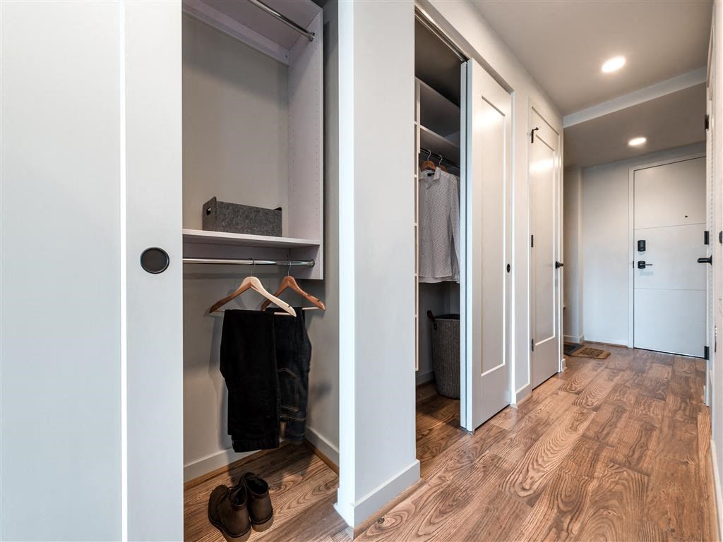 a walk in closet in a new home