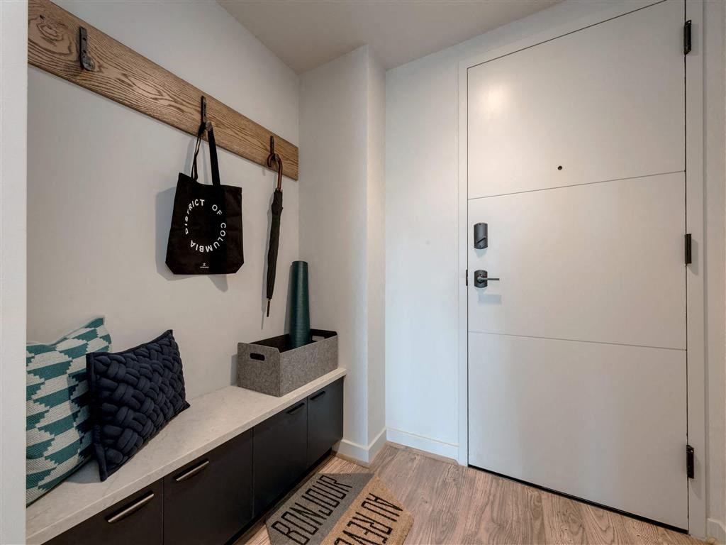 a bedroom with a closet and a white door