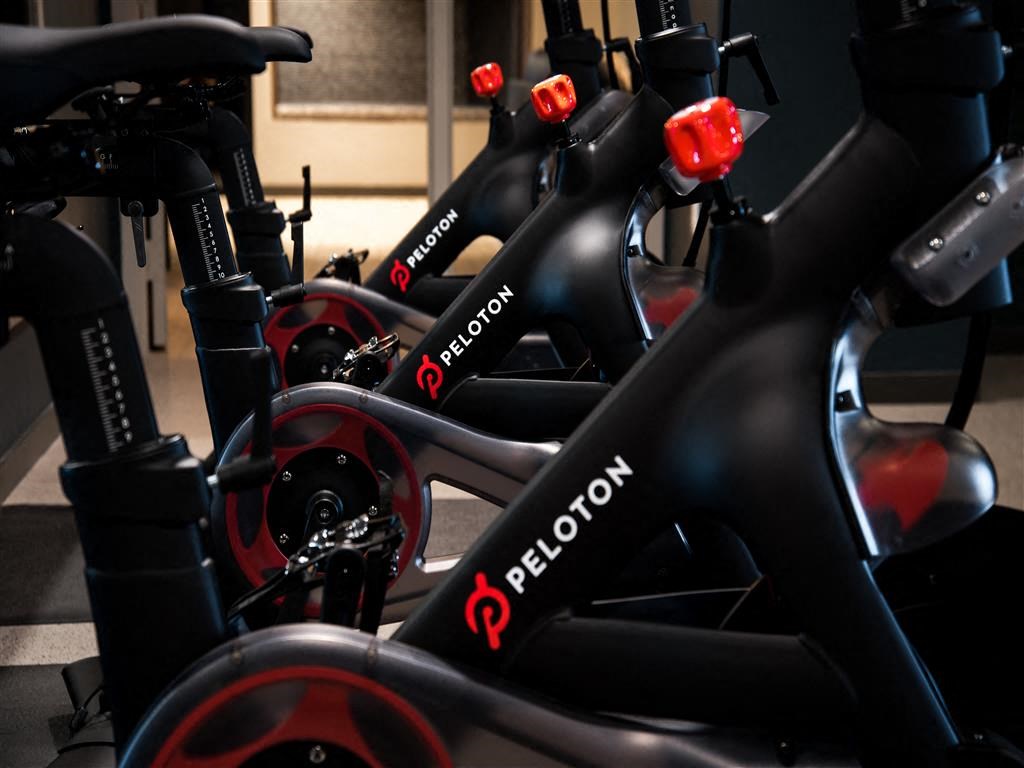 a row of bikes in a gym
