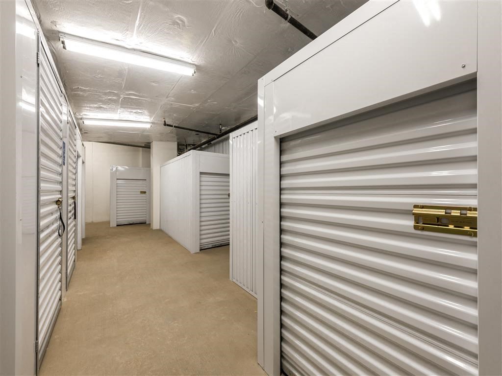 a room filled with metal storage containers