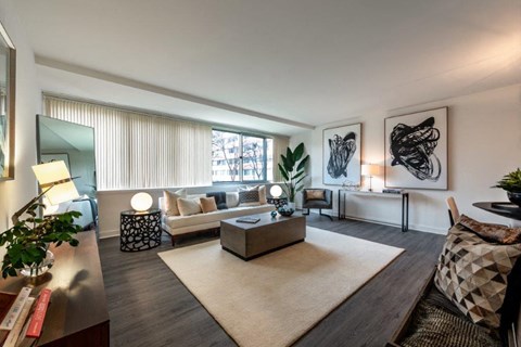 a living room with a couch and a table