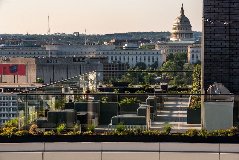 a view of the capitol building from the roof of a building