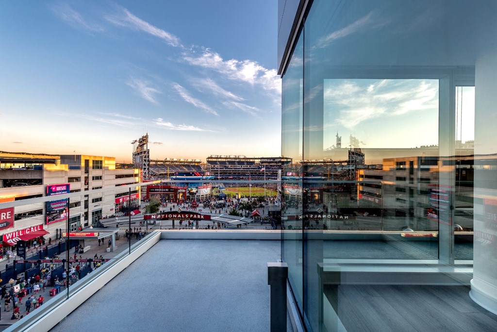 a view of the city from a balcony of a building