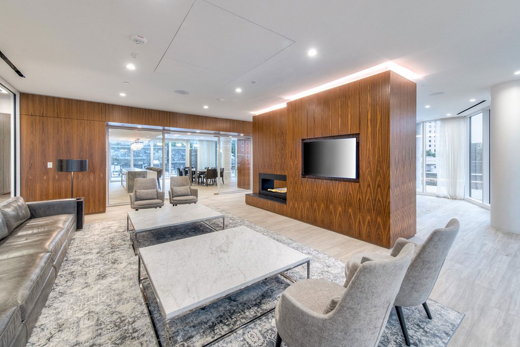 a living room with a couch and a table and a television