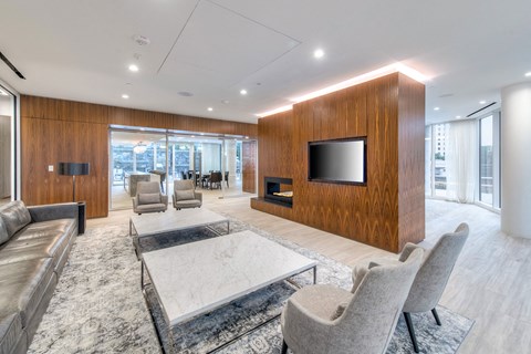 a living room with a couch and a table and a television