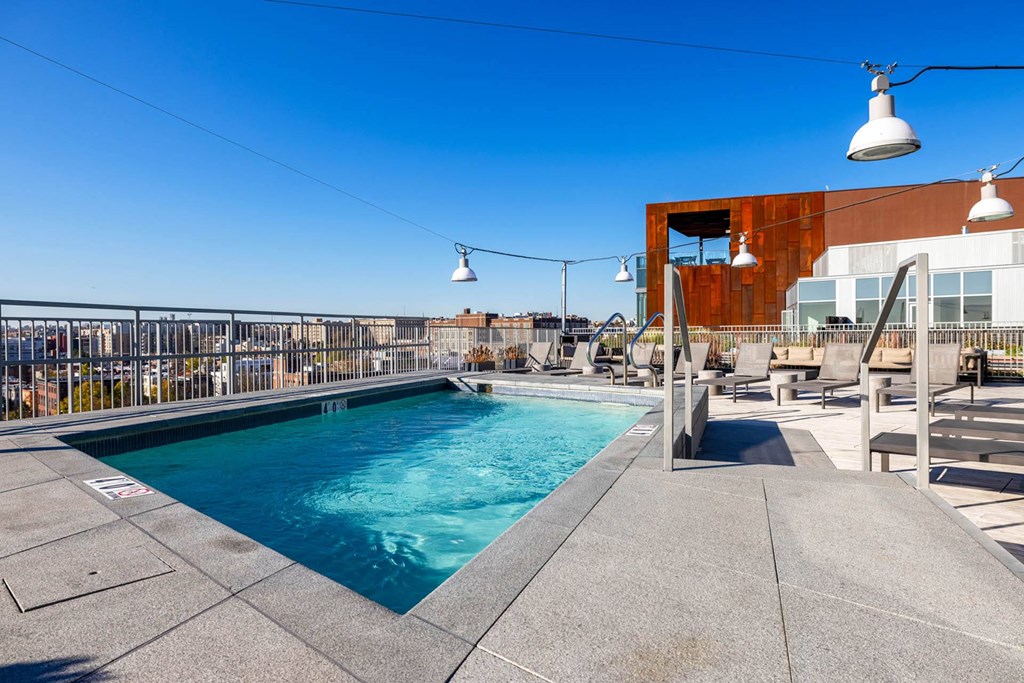 the pool is on the roof of the building