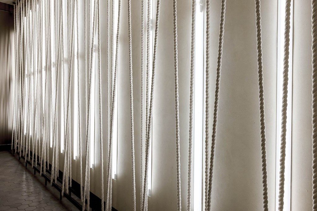 the sun shining through the windows of a building