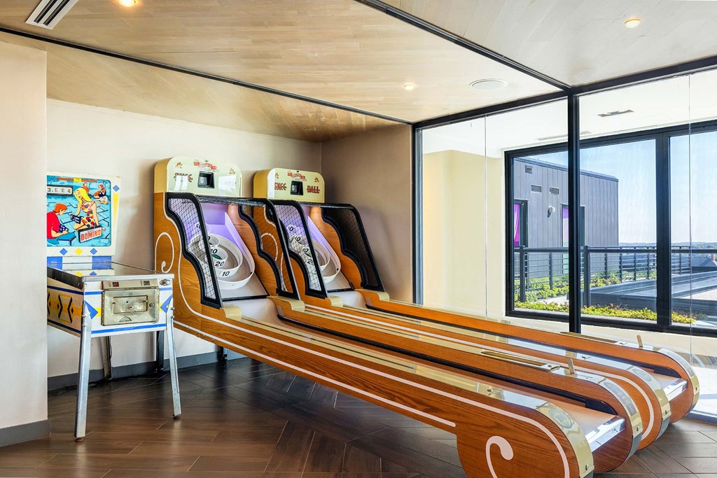 a room with a bed and a table in a hotel room