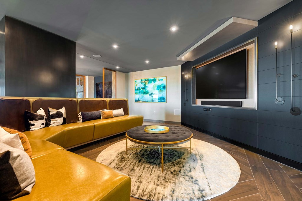 a living room with a couch and a television