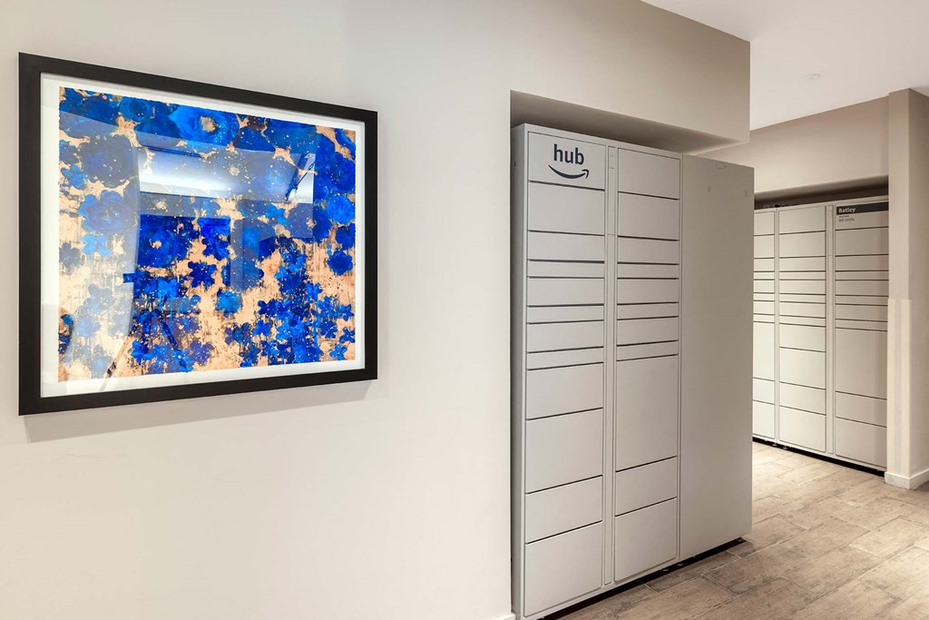 a large painting on the wall in a room with a closet