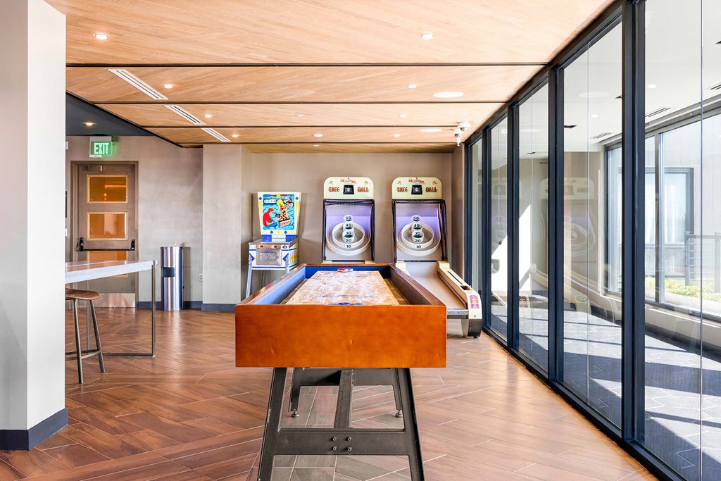 a foosball table in the center of a room with machines