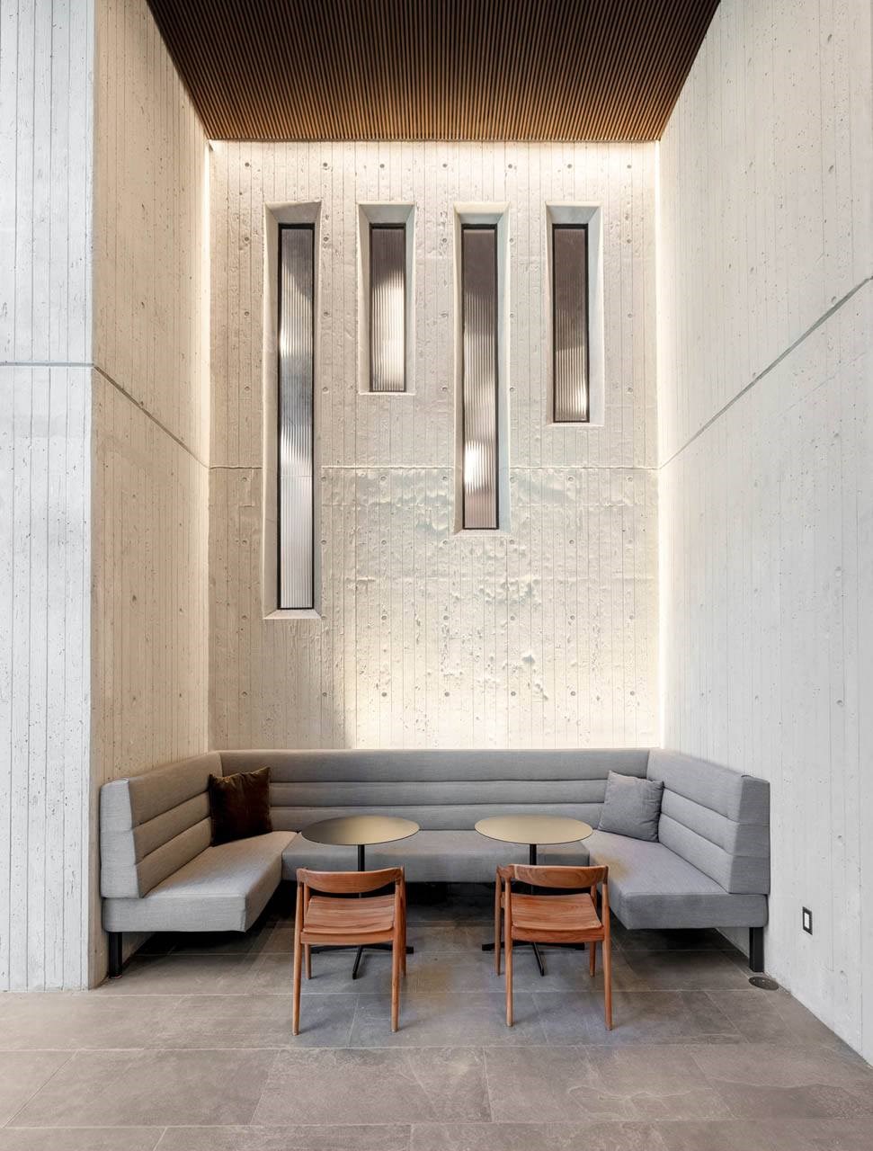 a living room with a couch and tables