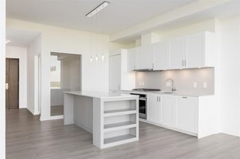 Wood-style flooring in warm grey or beige tones