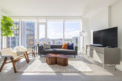 a living room with a couch and a television