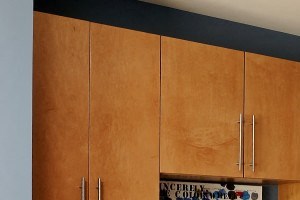 Kitchen with stainless steel appliances and a breakfast bar