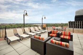 Rooftop with comfortable seating areas and Potomac River views
