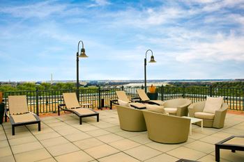 Rooftop with comfortable seating areas and Potomac River views