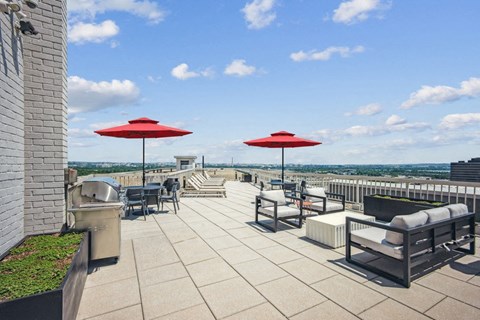 the rooftop terrace at the clarion hotel with umbrellas