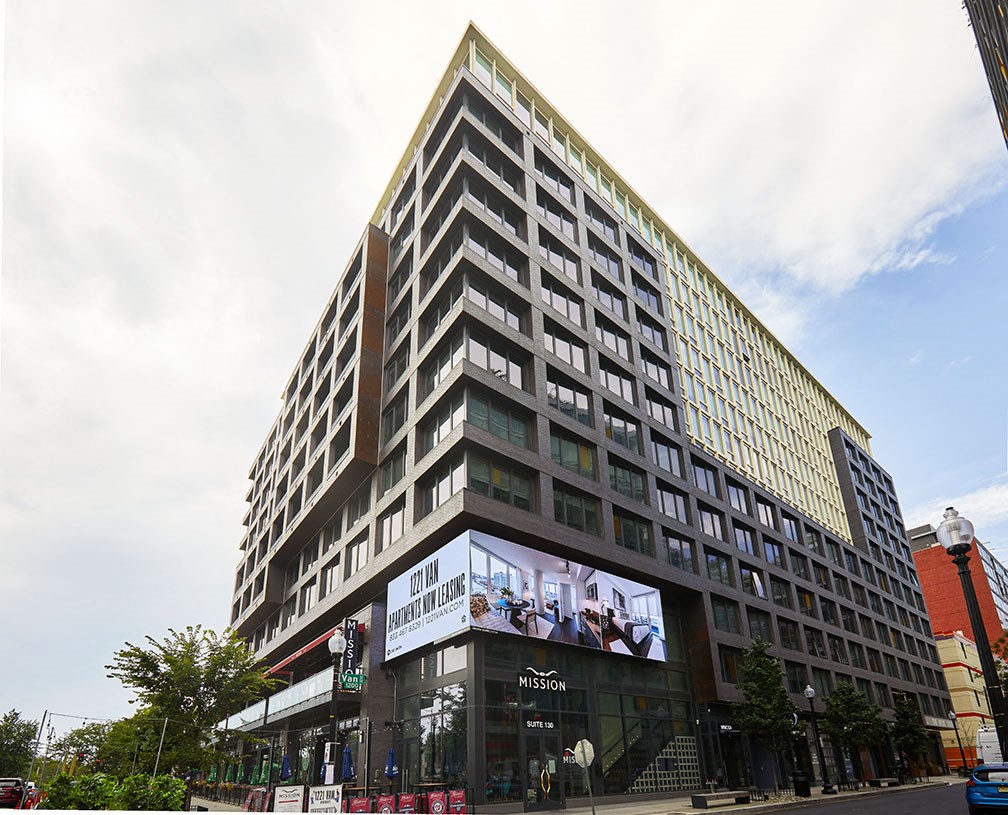 a tall building with a large advertisement on the side of it