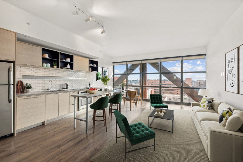 an apartment with a kitchen and a living room
