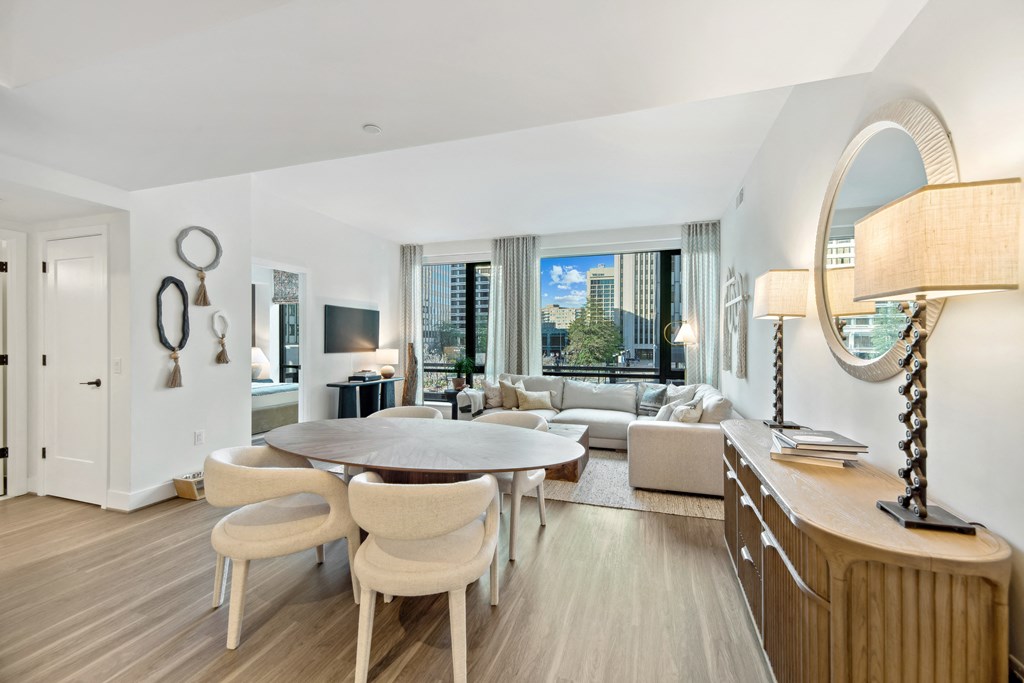 a living room filled with furniture and a table