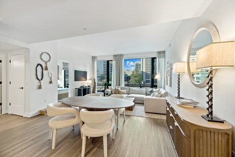 a living room filled with furniture and a table at The Grace and Reva, Arlington, VA, 22202