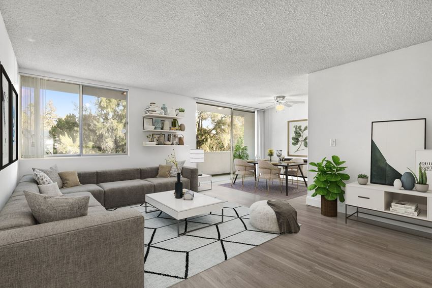 Apartments for Rent in Sherman Oaks CA - Open Space Living Room with Stylish Interiors and Hardwood Floors Also Featuring Sliding Door to Balcony - Photo Gallery 1