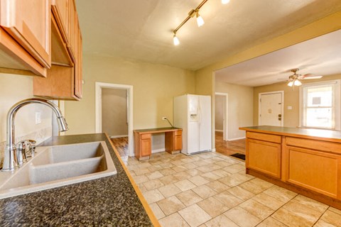 a kitchen with a sink and a counter top