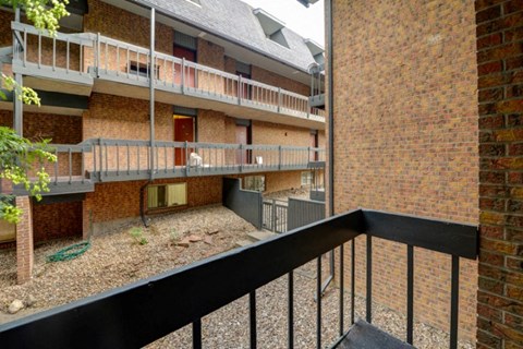 the view from the balcony of an apartment building