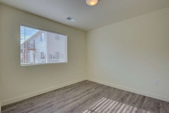 an empty room with a large window