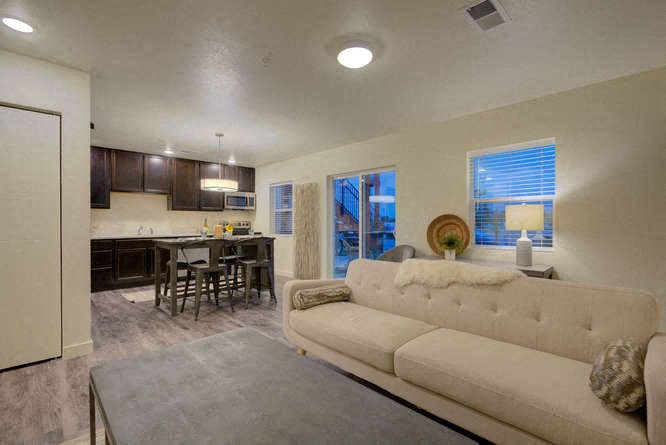 a living room with a couch and a table