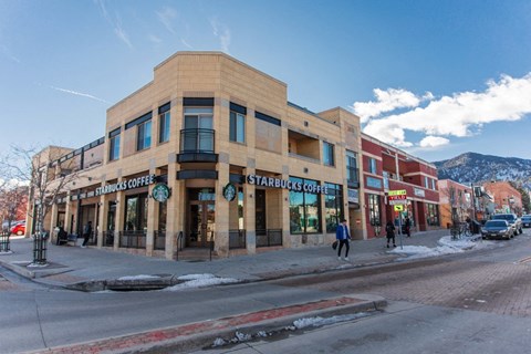 a building on the corner of a city street