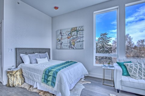 Bedroom with a Bed at Sloan's Place Apartments, Denver, Colorado