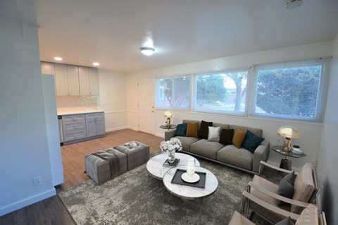 a living room with a couch and a table