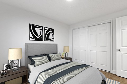 A bedroom with a bed, two nightstands, and a painting on the wall.