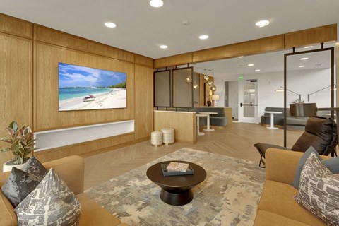 a living room with a couch and a table