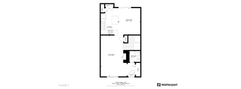 A floor plan of a house with a kitchen, living room, and two bedrooms.