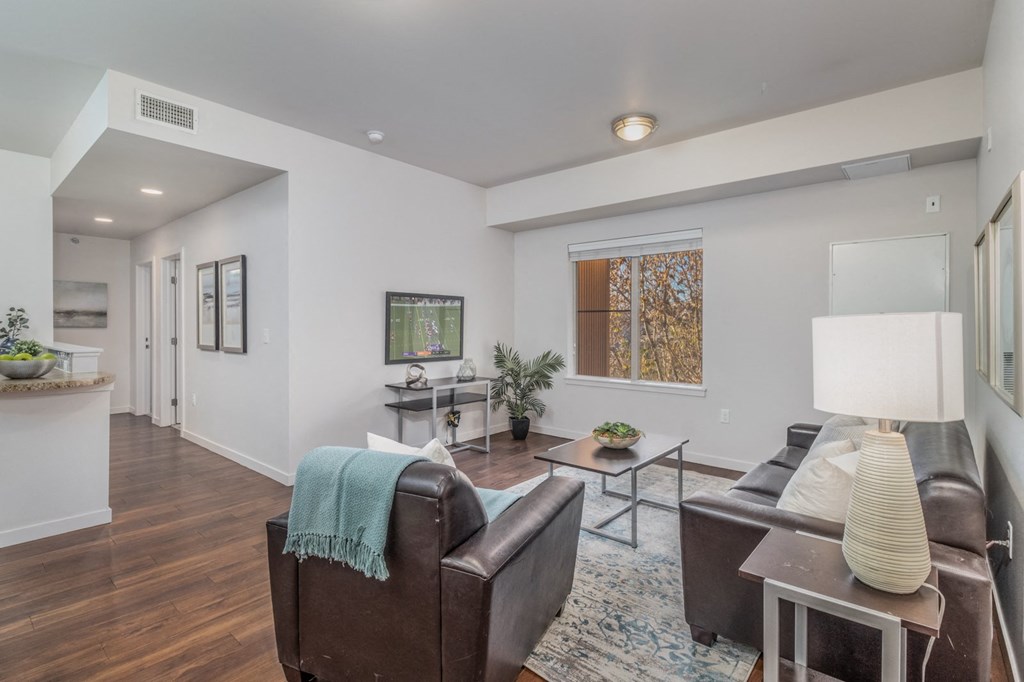 a living room with a couch and a chair