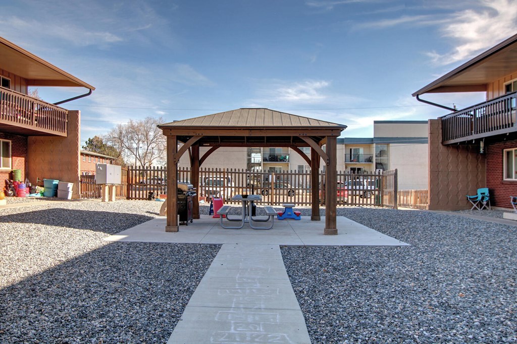 a gazebo with a bicycle parked in front of it