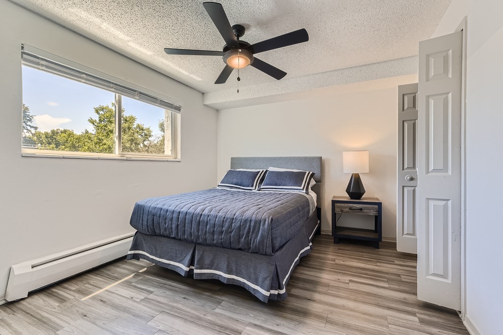 Renovated Master Bedroom at Postmark at Littleton Apartments, Littleton