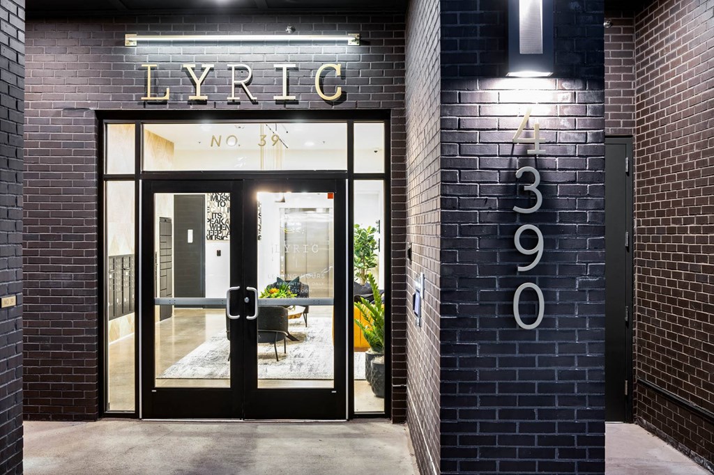 the entrance to the lyrrc building with a large glass door