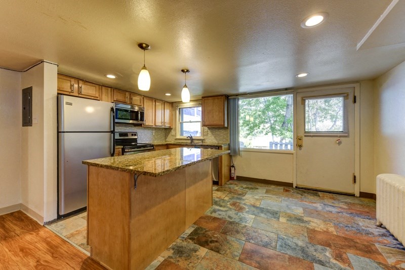 the lobby of a building with four arrows on top of it