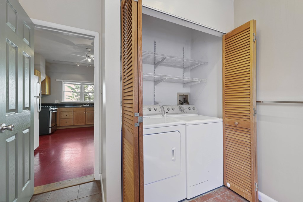 A laundry room with a washer and dryer.