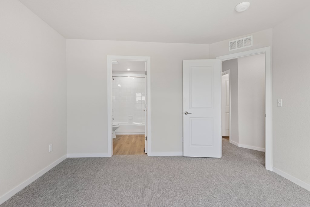 Room with a carpeted floor at The Townhomes at Pine Drive, Parker, Colorado